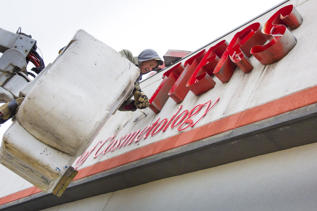 Our old sign is coming down!